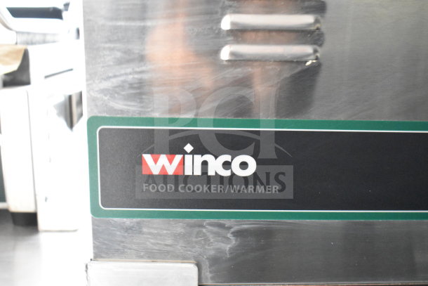 Winco food cooker/warmer label on stainless steel appliance, part of 2021 Rock Solid Cargo 28ft Commercial Food Trailer.