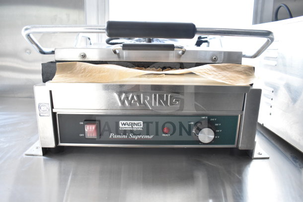 Waring Commercial Panini Supremo grill in 2021 Rock Solid Cargo food trailer, features stainless steel construction and temperature control.