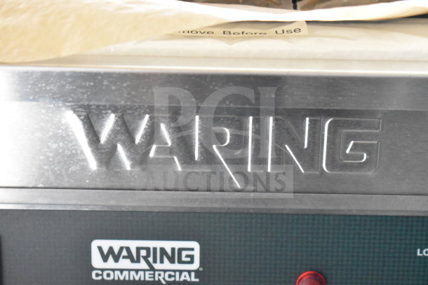 Waring Commercial appliance close-up, part of 2021 Rock Solid Cargo 28ft Food Trailer with premium kitchen equipment.