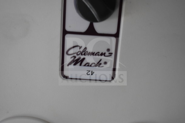 Close-up of a Coleman-Mach air system control inside the 2021 Rock Solid Cargo 28ft food trailer.
