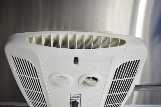Roof vent inside a 2021 Rock Solid Cargo 28ft food trailer. Features air control dials and exhaust slots, in new condition.