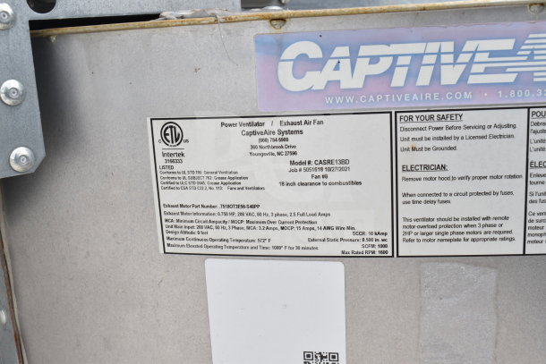 CaptiveAire label on Rock Solid Cargo food trailer showing model CASRE13BD, job #5051618, safety instructions, and specs.
