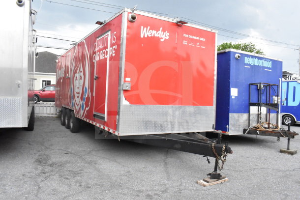 2021 Rock Solid Cargo 28ft triple-axle food trailer, branded for Wendy's. Features Henny Penny fryer, Taylor griddle, CaptiveAire hood.
