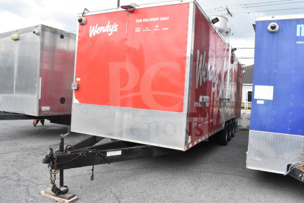 2021 Rock Solid Cargo 28ft Triple-Axle Red Food Trailer, branded "Wendy's", includes Henny Penny Fryer and full refrigeration.