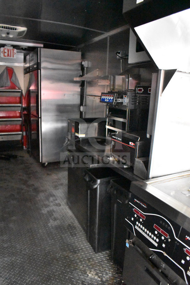 2021 Rock Solid Cargo 28ft food trailer with Henny Penny fryer, Taylor griddle, and full refrigeration. VIN: 7H2BE283XND041759.