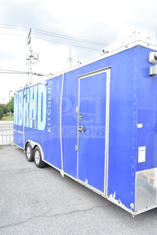 NBRHD Kitchens food trailer with dual Pitco fryers, CaptiveAire hood, Arctic Air refrigeration, Daikin mini-split, visible wear.