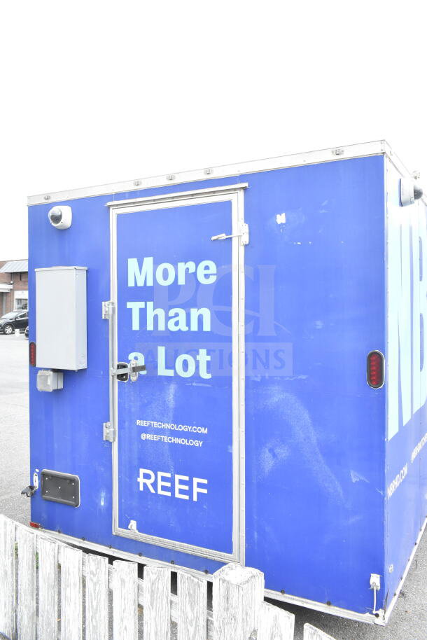NBRHD Kitchens Ghost Kitchen trailer, blue exterior. Features dual Pitco gas fryers, CaptiveAire hood, Arctic Air fridge, Daikin mini-split.