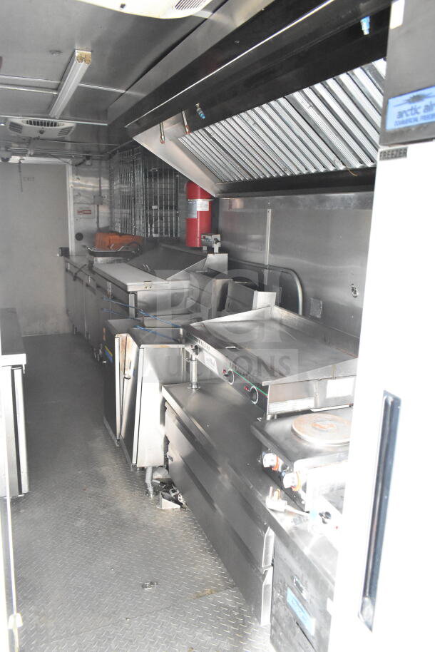 NBRHD Kitchens food trailer with dual Pitco gas fryers, CaptiveAire hood, Arctic Air refrigeration, Daikin mini-split.