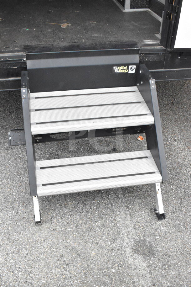 2020 Southern Dimensions 20ft mobile trailer steps, Solid Step branding visible. Tandem axle, 14,000 lb GVWR.