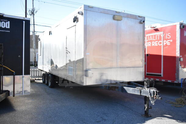 Alt text: 2021 Texino 28ft Triple-Axle Cooking Trailer, equipped with Ultrafryer Ultrastat23, CaptiveAire Hood, True Refrigeration.