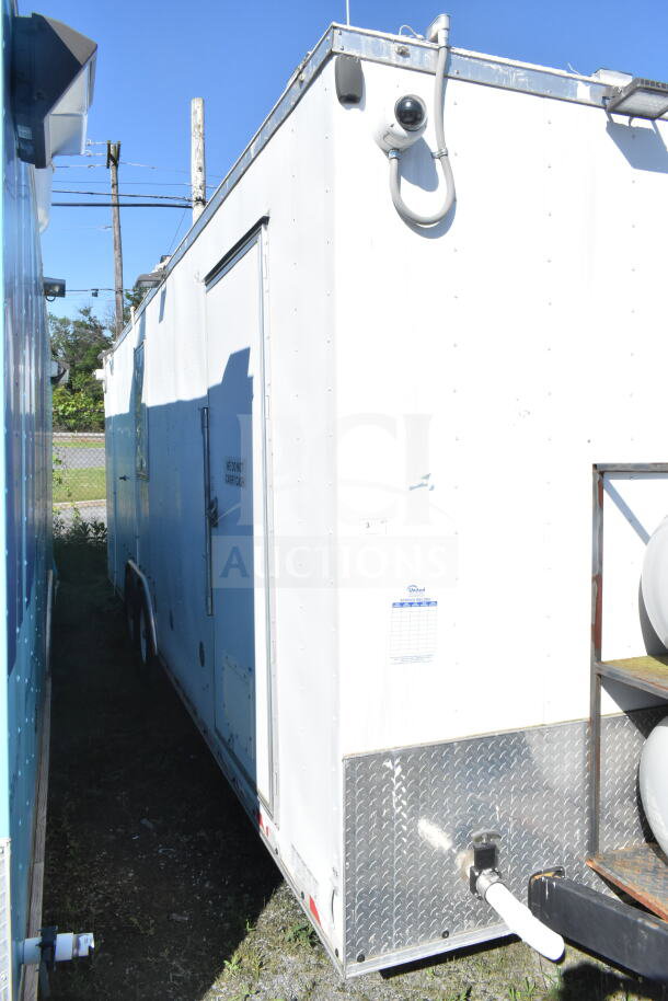2021 Diamond Cargo 8.5'x24' food trailer, white exterior, VIN 53NBE242XM1089713. Features exterior security camera.