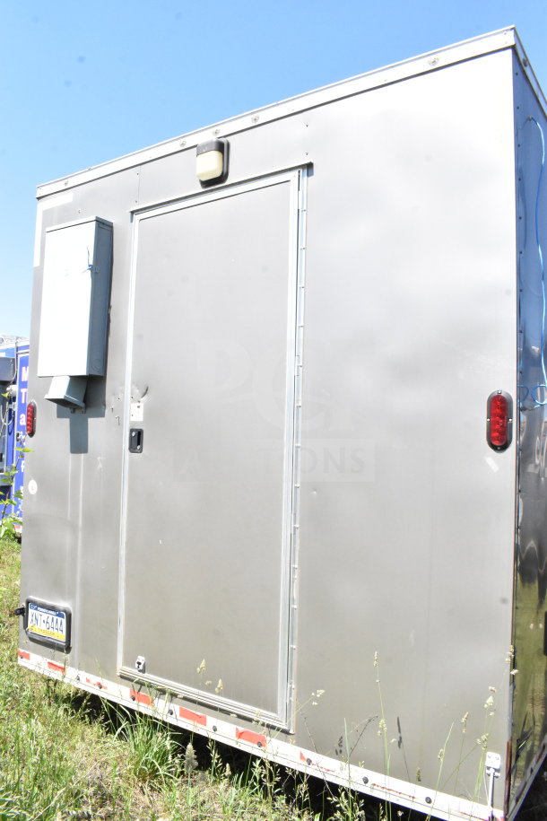 2021 Diamond Cargo 8.5'x24' Food Trailer, silver exterior, visible door, and vent. VIN: 53NBE2424M1089867.