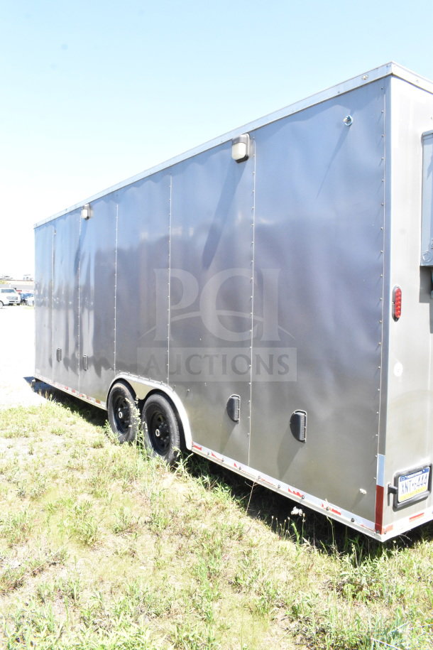2021 Diamond Cargo 8.5'x24' food trailer. Dual axle, metallic finish, excellent condition. VIN: 53NBE2424M1089867.