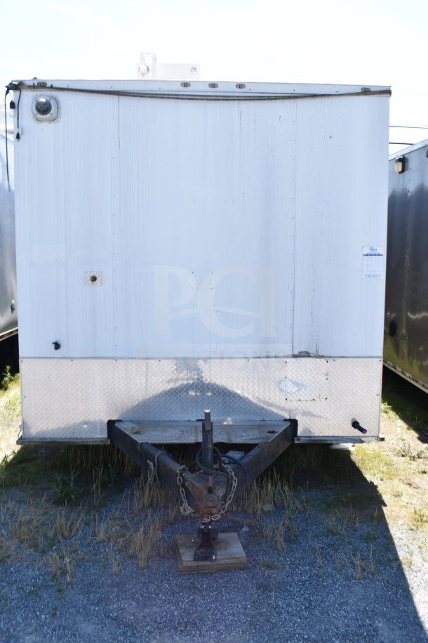 2019 Diamond Cargo 8.5'x24' food trailer, white exterior, visible wear, VIN: 53NBE2426L1076066, front view with hitch.