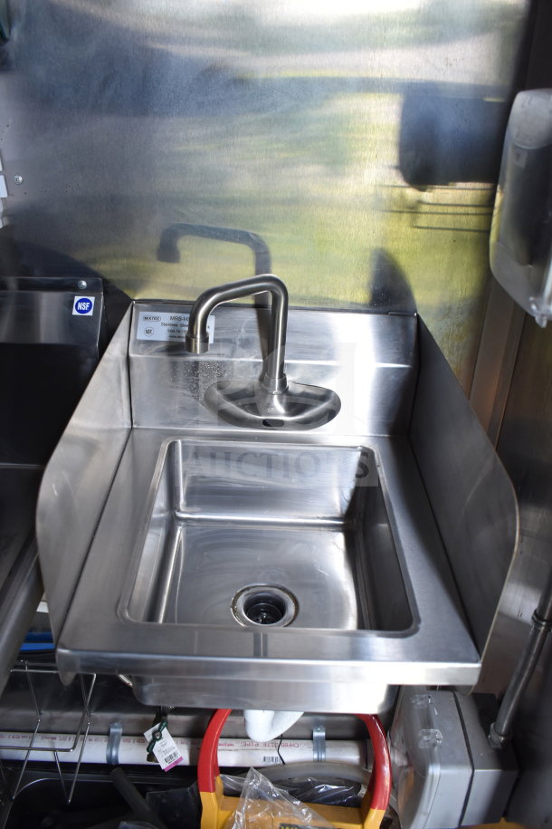 Stainless steel sink with sensor faucet in 2021 Cruising Kitchens food trailer, NSF certified.