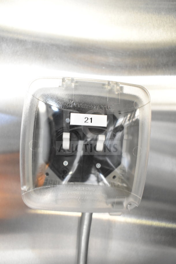 2021 Cruising Kitchens food trailer's interior shows an Intermatic electrical switch with a protective cover, labeled "21".