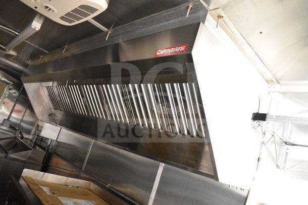 2021 Cruising Kitchens food trailer featuring CaptiveAire grease hood, stainless steel interior, excellent condition.