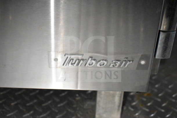Turbo Air refrigeration unit on 2021 Cruising Kitchens 8.5'x24' food trailer, featuring stainless steel finish.
