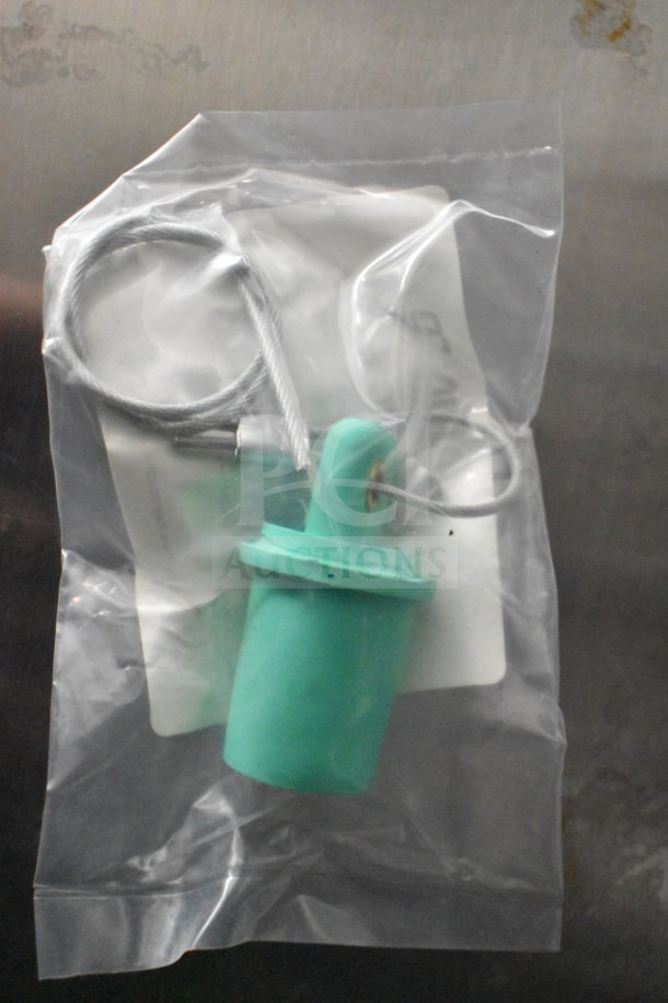A replacement part set for a kitchen appliance, sealed in a clear plastic bag. Includes a green component with attached metal cable.