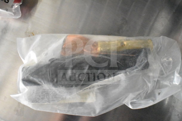 Plastic-wrapped component for 2021 Cruising Kitchens Food Trailer, includes wiring and connection parts, condition appears unused.