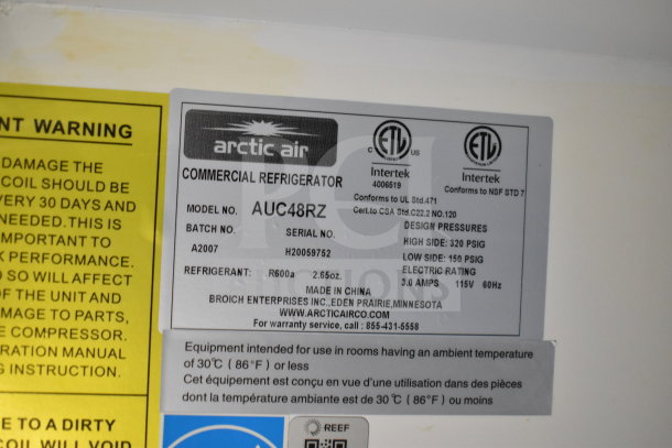 Label for Arctic Air commercial refrigerator, model AUC48RZ, showing specifications and safety information.