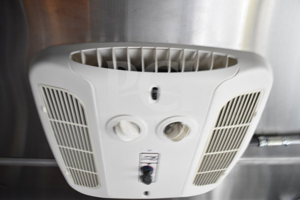 Ceiling-mounted ventilation control panel inside a 2021 Cruising Kitchens food trailer, featuring air vents and knob controls.