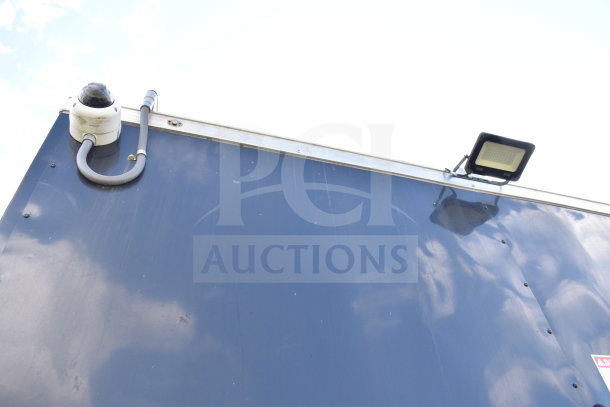 2021 Cruising Kitchens food trailer with security camera and exterior lighting, 8.5'x24', equipped with CaptiveAire hood.