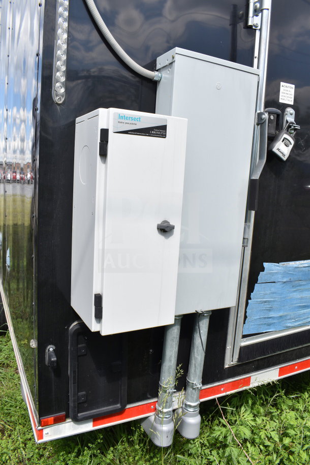 2021 Cruising Kitchens 8.5'x24' food trailer exterior with Intersect power box, part of an auction listing.