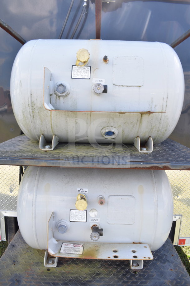 2021 Cruising Kitchens food trailer features exterior propane tanks with fill and vapor labels, showing signs of wear.