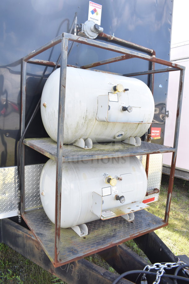 2021 Cruising Kitchens food trailer, visible propane tanks and shut-off switch. Equipped with CaptiveAire hood and griddle.