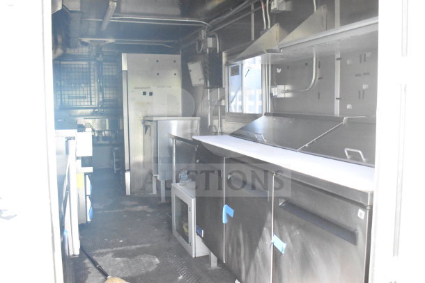 2020 Diamond Cargo 8.5'x24' food trailer interior, stainless steel counters, storage, clean condition. VIN: 53NBE2422L1083693.