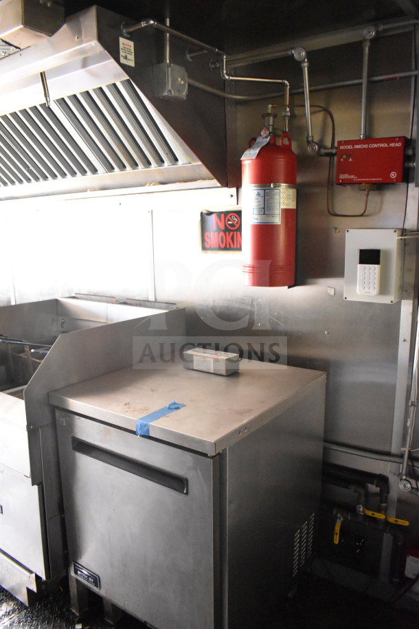 2020 Diamond Cargo 8.5'x24' food trailer interior with stainless steel equipment and fire suppression system.