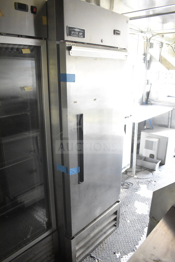 2020 Diamond Cargo 8.5'x24' food trailer interior showing Arctic Air commercial freezer.