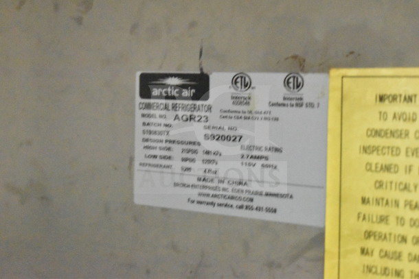 Arctic Air commercial refrigerator label, model AGR23, with specifications and serial number S920027 visible.