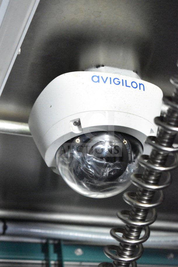 Ceiling-mounted Avigilon security camera inside the 2020 Diamond Cargo food trailer, model 8.5'x24'.