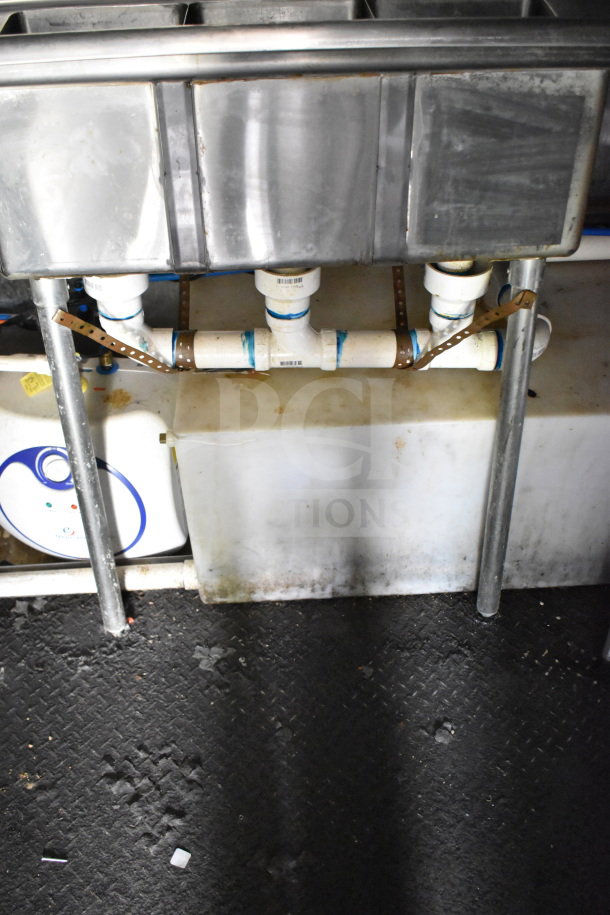 2020 Diamond Cargo 8.5'x24' food trailer interior sink plumbing, showing pipes and water heater, in used condition.