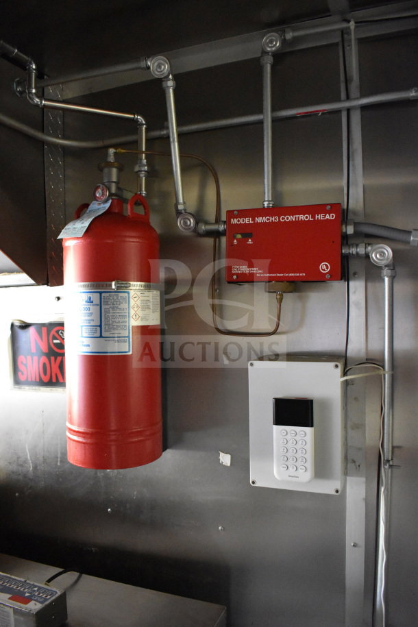 2020 Diamond Cargo 8.5'x24' food trailer fire suppression system with Model NMCH3 control head visible.