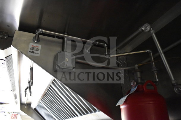 Interior view of 2020 Diamond Cargo 8.5'x24' food trailer showing ventilation system, piping, and fire extinguisher.
