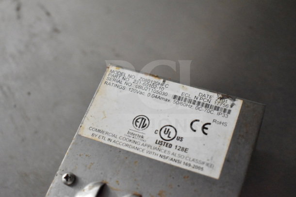 Image showing a label on a component. Details include Model No: Z080120HFC, Serial No: 0BU21105030, and electrical ratings 120Vac, 0.04Amax. Contains ETL and UL certifications.