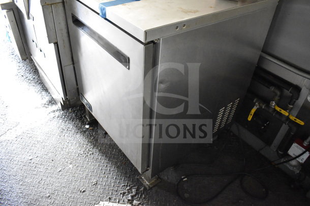 2020 Diamond Cargo 8.5'x24' food trailer interior showing stainless steel equipment with slight wear.