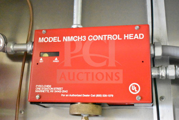 Red Pyro-Chem NMCH3 control head in a 2020 Diamond Cargo 8.5'x24' food trailer, Model NMCH3, UL listed.