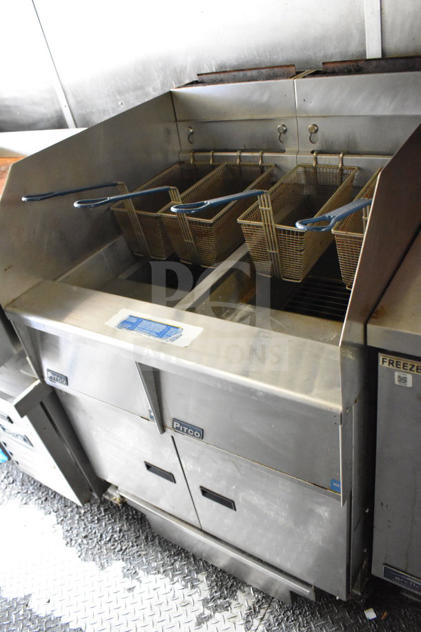 2020 Diamond Cargo 8.5'x24' food trailer interior with Pitco fryer. Stainless steel, good condition, includes fryer baskets.