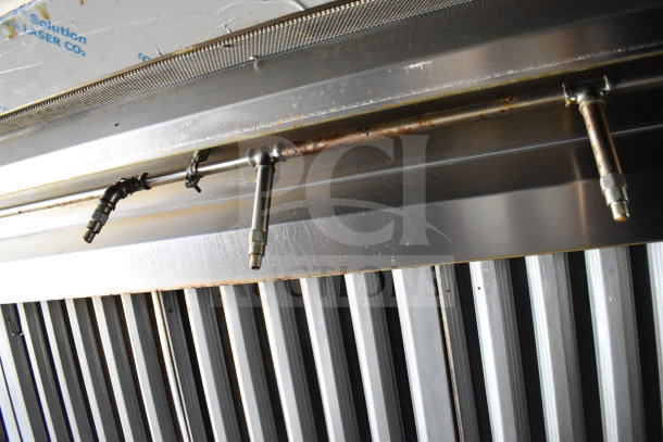 2020 Diamond Cargo 8.5'x24' food trailer interior, showing stainless steel fittings and ventilation hood details.