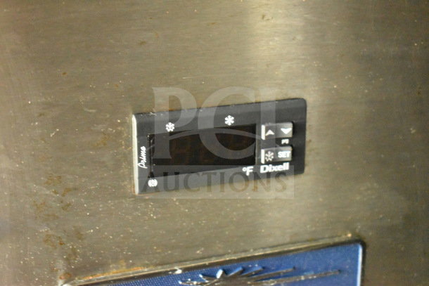 Control panel on 2020 Diamond Cargo 8.5'x24' Food Trailer. Dixell display shows temperature. Some wear visible.