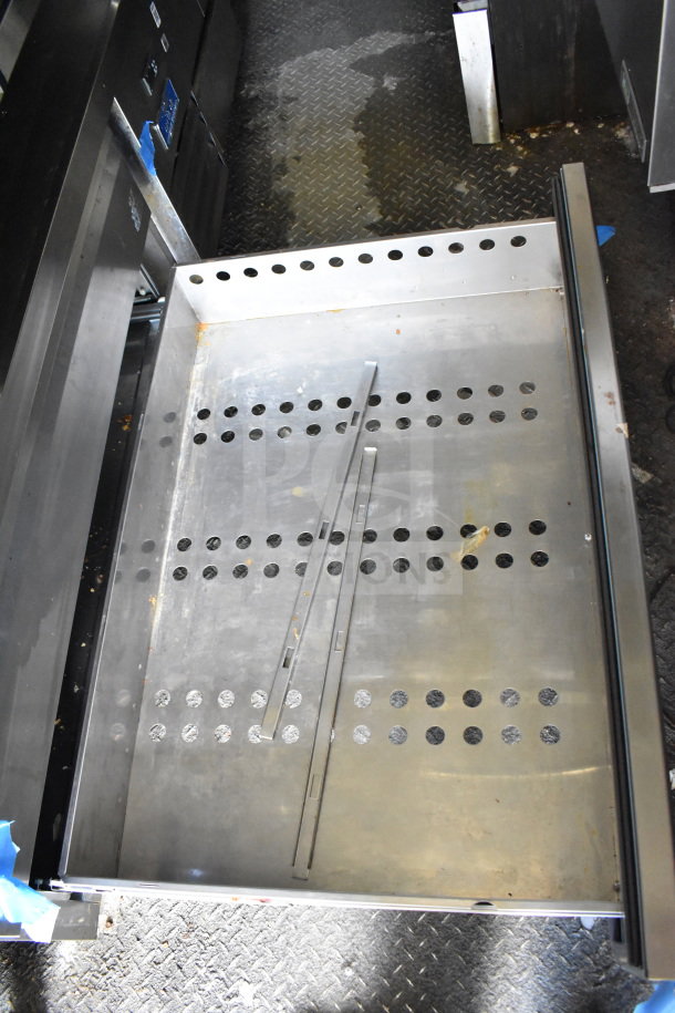 2020 Diamond Cargo 8.5'x24' food trailer interior, metal flooring with perforations, VIN visible, clean condition.