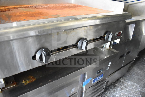 2020 Diamond Cargo 8.5'x24' food trailer interior with stainless steel cooking equipment, used condition.