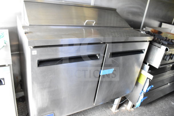 2020 Diamond Cargo 8.5'x24' food trailer interior, featuring stainless steel kitchen equipment, clean condition.