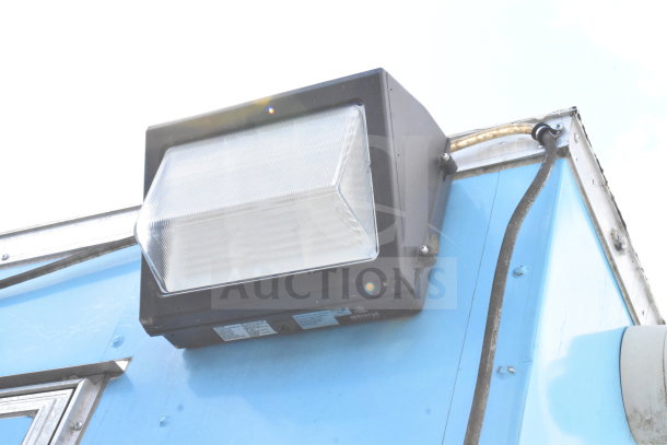 2020 Diamond Cargo 8.5'x24' food trailer exterior showing a mounted light fixture and visible wiring.