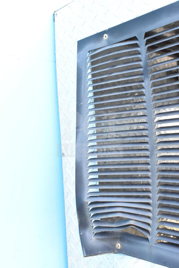 2020 Diamond Cargo food trailer exterior vent detail, showcasing metal slats.
