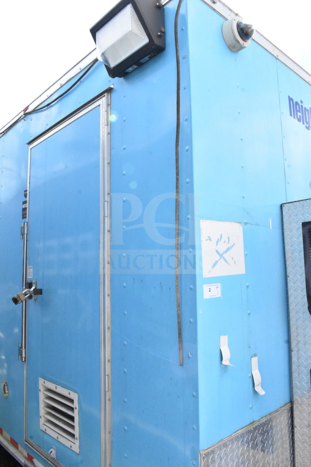 2020 Diamond Cargo 8.5'x24' food trailer, blue exterior, includes grease hood, suppression system, and kitchen equipment.